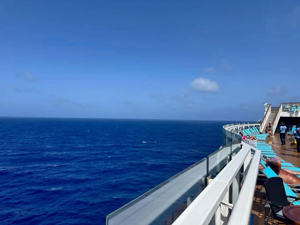 IMG_6444 View from the deck of the Mardi Gras while at sea, blue skies and perfectly blue water.